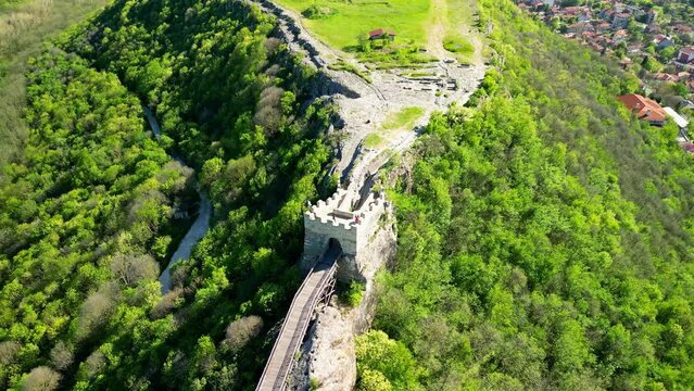 Ovech Fortress is a stone stronghold located east of the town of Provadia, Bulgaria. The fortress was inhabited successively by Thracians, Romans, Byzantines, Bulgarians, and Turks. sunset sky - Image