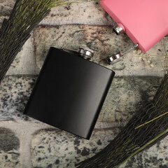 Black colors stainless flask. Concept shot, top view. Custom background flask view. Flask and accessories.
