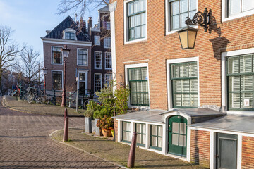 Canal house with lowered extension - pothuis, in the center of Amsterdam.