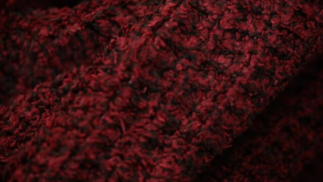 Warm and thick red woolen fabric close