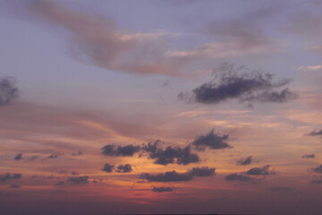 Fototapeta na wymiar Cloudy sunset with orange sky