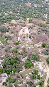 Drone explores Okuzlu's basilica ruins, unveiling travel treasures. Historic Okuzlu by air: travel back to basilica's past. Okuzlu's aerial travel glimpse: Basilica's ancient beauty