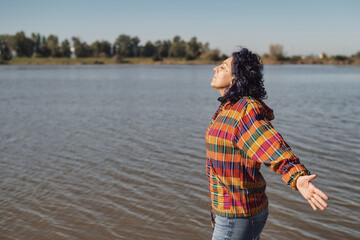 Woman Breathing Fresh Air Outdoors In Nature