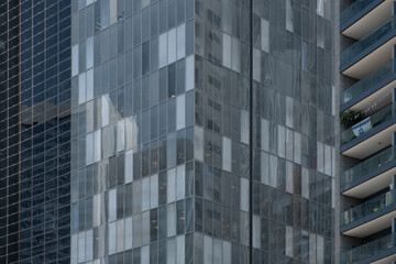 Obraz premium Modern office buildings in Israel feature impressive glass facades and windows, creating a captivating abstract architecture background