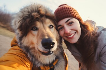 Couple and dog taking selfie photo