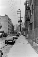 Archival 1985 black and white editorial view of Banning Street near Santa Fe Ave in downtown LA. ...