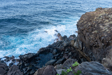 waves crashing on rocks