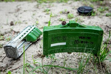 a unique collection of photographs of explosive objects, mines, shells and rockets, used in various...
