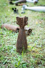 a unique collection of photographs of explosive objects, mines, shells and rockets, used in various military conflicts.