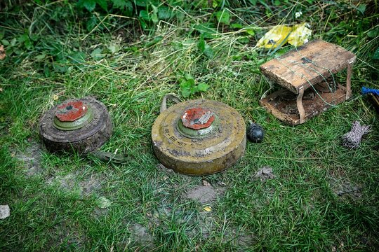a unique collection of photographs of explosive objects, mines, shells and rockets, used in various military conflicts.