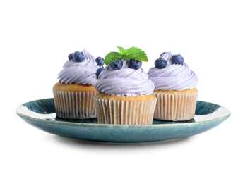 Plate of tasty cupcakes with blueberries on white background