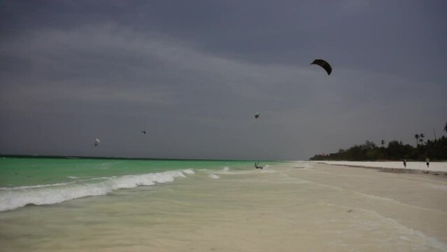 Wide shot of kite surfers near Kenya beach
