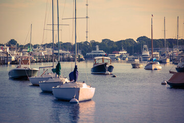 Cape Cod Marina Seascape at sunrise with mooring boats and yachts in Falmouth, Massachusetts