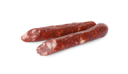 Thin dry smoked sausages isolated on white
