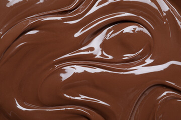 Tasty chocolate paste as background, closeup view