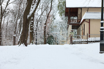 Picturesque view of city street covered in snow