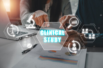 Clinical study concept, Business team using tablet computer on office desk with clinical study icon...