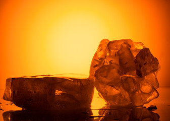 ice for the product presentation podium. beautiful natural ice with orange-gold backlight for the...