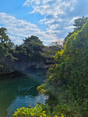 This is Soesokkak, Jeju Island, where a river and a forest come together.