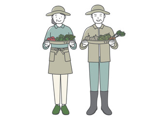 籠に盛った野菜を持つ中高年の男性と女性