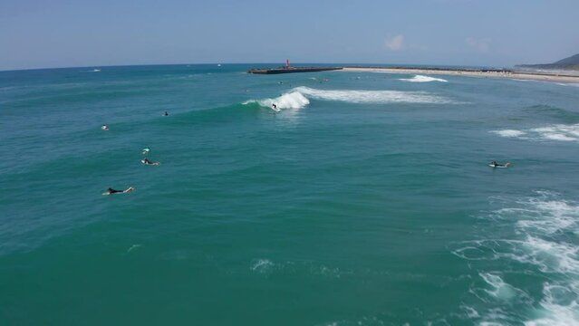 Drone flight over surfers in Aoshima Miyazaki
