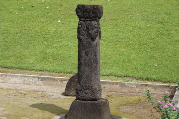 The menhir stone in the Penataran temple is a place of worship for ancestral spirits, to ward off...