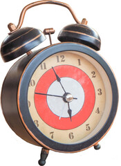 An antique clock placed on a wooden table