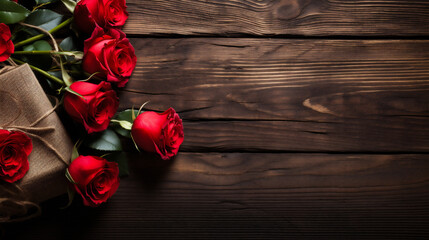 Red roses on wooden background. Valentines day background with copy space
