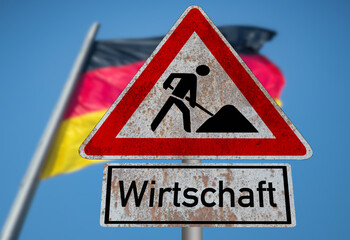 Deutsche Flagge und Verkehrsschild Baustelle