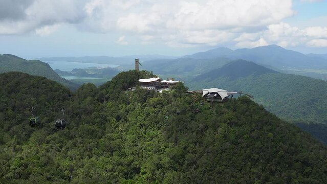 Picturesque tourism cable cars on mountainside of Langkawi, Malaysia