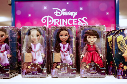 Honolulu, HI - December 21, 2023: Disney Princess dolls Asha and Dahlia from the animated feature film Wish 