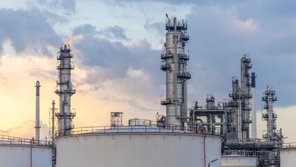 Oil and gas industrial refinery at twilight, Oil refinery and Petrochemical plant pipeline steel,...