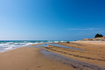 Fototapeta na wymiar The gorgeous sandy beach of Issos in Corfu island, Greece