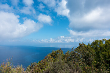 Fototapeta premium Stunning view down to the sea and the surrounding area from top of the mountain in Ereikoussa island, Greece