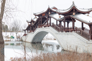 A bridge covered with snow in winter