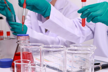 Researcher hand holding a blood vessel Vascular examination in a research laboratory Medical science laboratory, blood collection