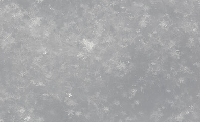 White snowflakes in winter as an abstract background. Texture