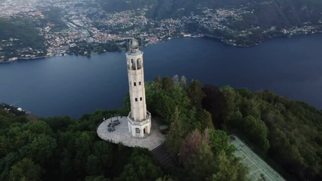 Aerial of The Faro Voltiano lighthouse overlooking Lake Como, Italy