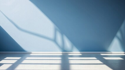 Obraz premium Empty room with blue walls, wooden floor and light shadow from the window, seen from the front. Modern minimalist background for product presentation or display 
