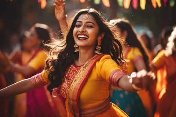 Sierkussen Beautiful indian girl in sari dancing at the street, Beautiful Indian women wearing vivid colorful clothes singing and dancing during the Teej festival, AI Generated © Iftikhar alam