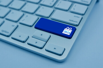 Gift box happy new year 2024 flat icon on modern computer keyboard button, blue tone, Business shop...
