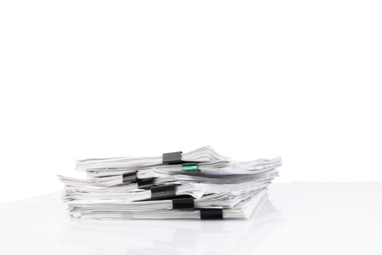A stack of papers in the office on a white table, Transparent background. PNG.