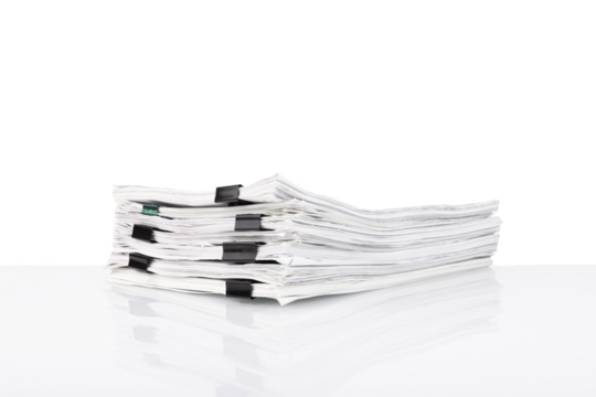 A stack of papers in the office on a white table, Transparent background. PNG.