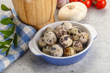 Raw quail eggs in the bowl