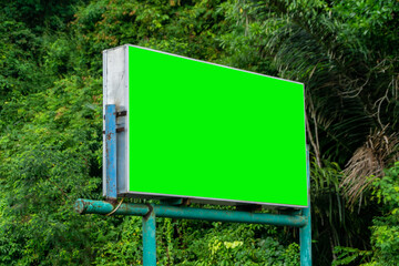 Green screen billboard at the sideway. Copy space signboard or outdoor billboards side the road. Concept of announcements and advertisements