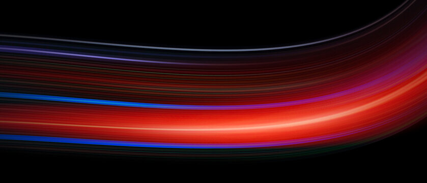 Colorful speed light trails on black background, motion blur effect. Banner design