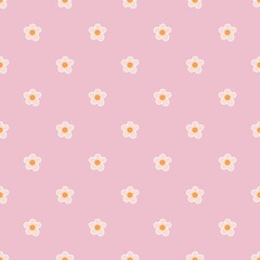 seamless pattern of white daisies with yellow stamens on a pastel pink background.