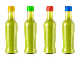 Set of bottles of hot sauce is spilling liquid on white background with clipping path