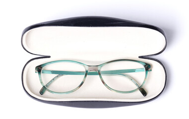 Pair of classics eyeglasses in case isolated on white