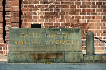 Sign for Castle Clinton or Fort Clinton, a national monument located at the southern tip of...